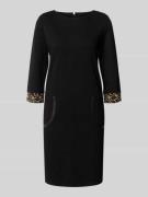 Knielange jurk met steekzakken