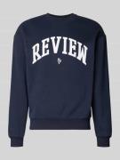 Sweatshirt met ronde hals met varsiety-emblemen