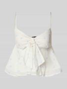 Blousetop met spaghettibandjes en knoopdetail