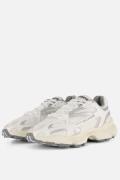 Lacoste L003 Evo 2K24 Sneakers wit Textiel