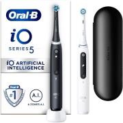 Oral B iO 5 black and white electric toothbrushes Designed by Bra