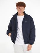 NU 20% KORTING: TOMMY JEANS Windbreaker TJM TONAL FLAG JACKET