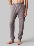 NU 20% KORTING: Calvin Klein Sweatbroek JOGGER met elastische logo-ban...