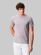 Calvin Klein T-shirt SS 30s E WRD STRTCH met grote logoprint op de rug
