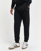 Gant Sweatbroek REG SHIELD SWEATPANTS met logo-borduurwerk onder de bo...